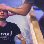 Water baptism and the laying on of hands